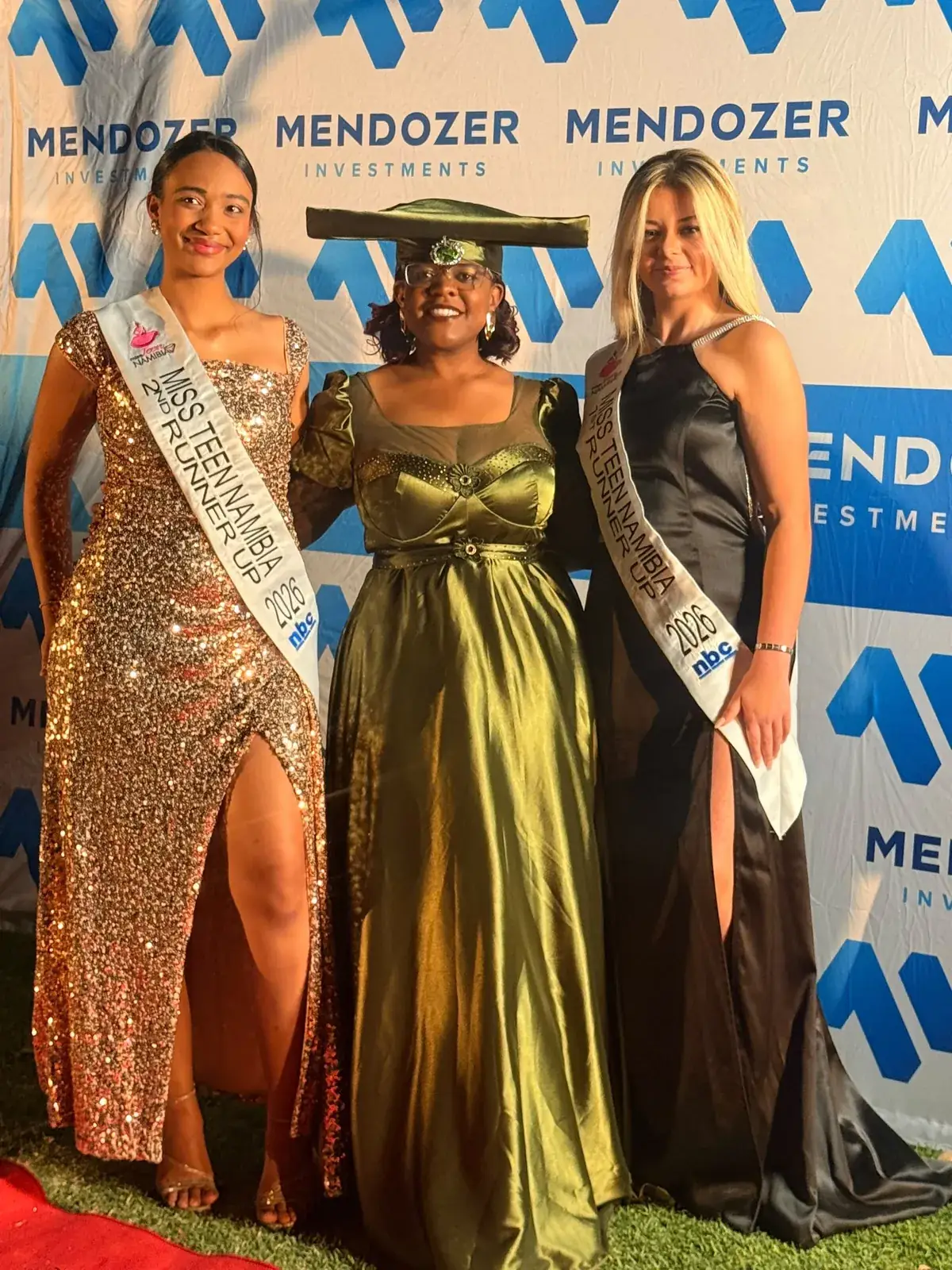 Miss Teen Namibia 2026 titleholders in front of a Mendozer-branded backdrop