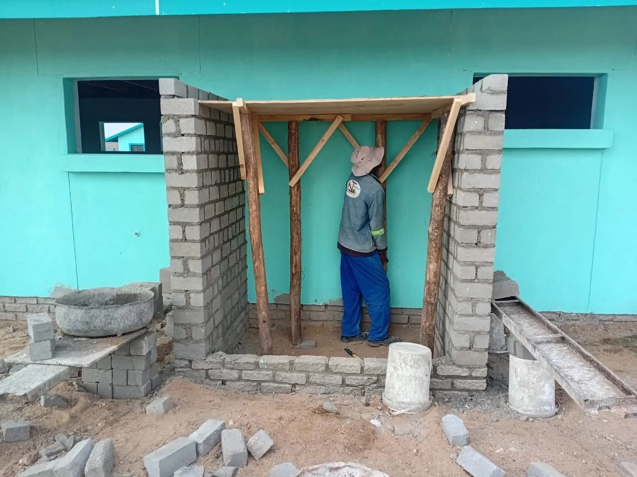 Timber and brickwork structure taking shape on site