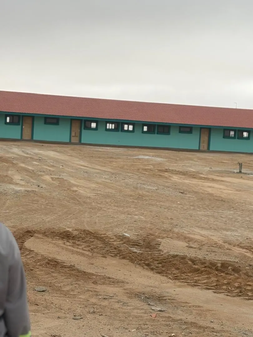 Classroom block with perimeter wall and graded access route at the Henties Bay school site