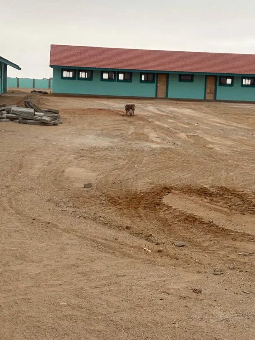 Wide view across the school site with earthworks in progress in Henties Bay