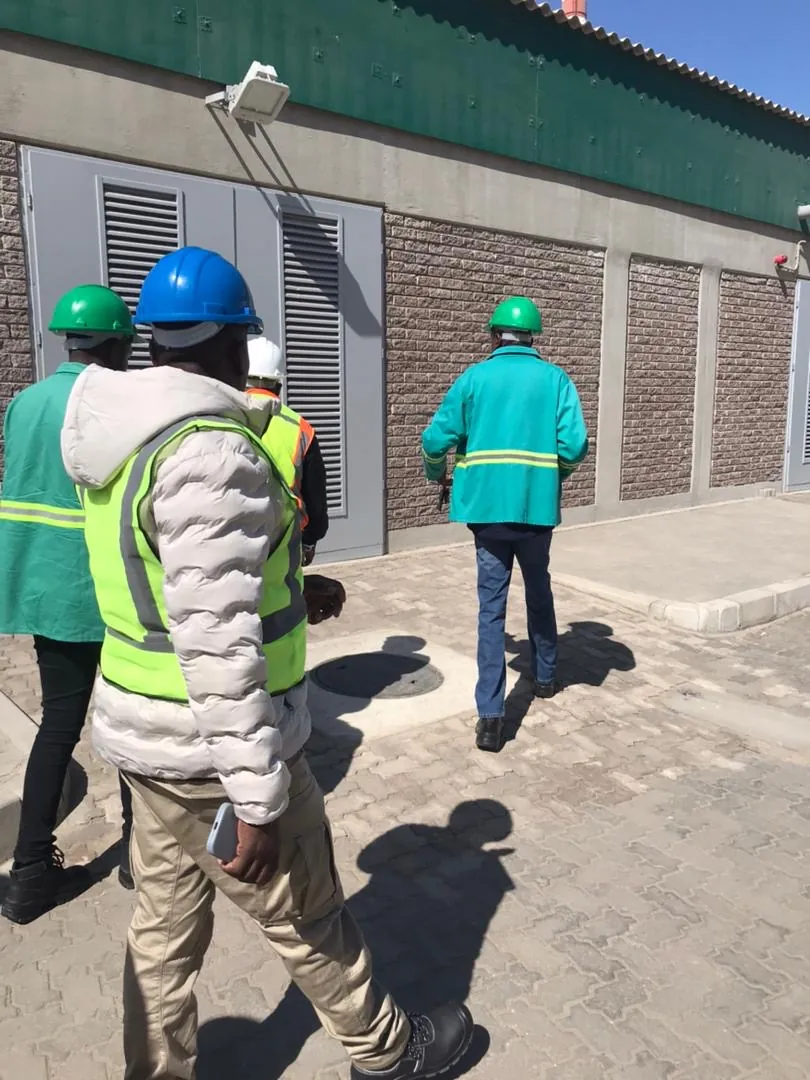 Team walking through an operational facility