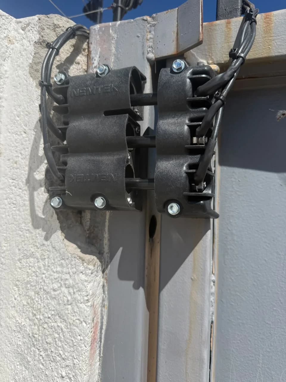 Conduit trench prepared during an electric fence installation