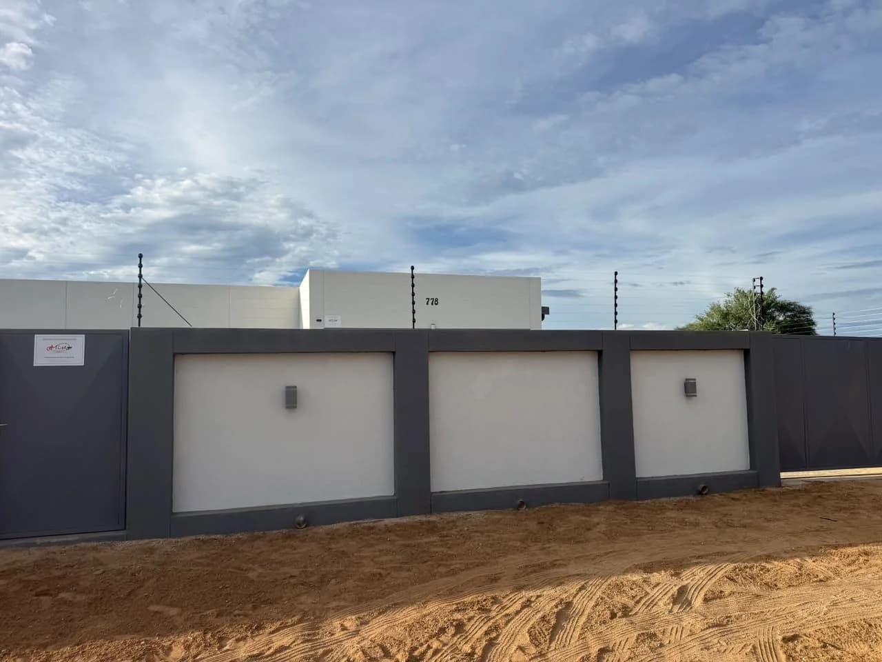 Electric fencing installed on a precast boundary wall