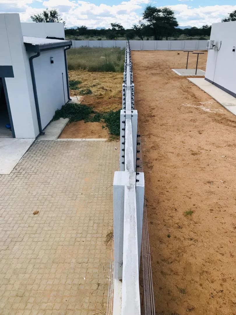 Automated sliding gate at an installed property