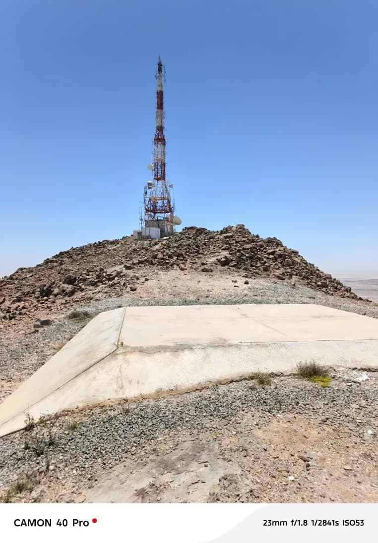A communications tower on a prepared site