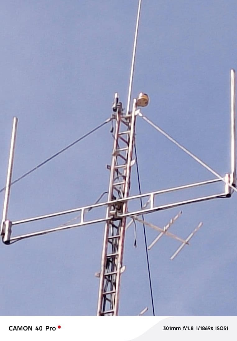 A communications antenna structure against the sky
