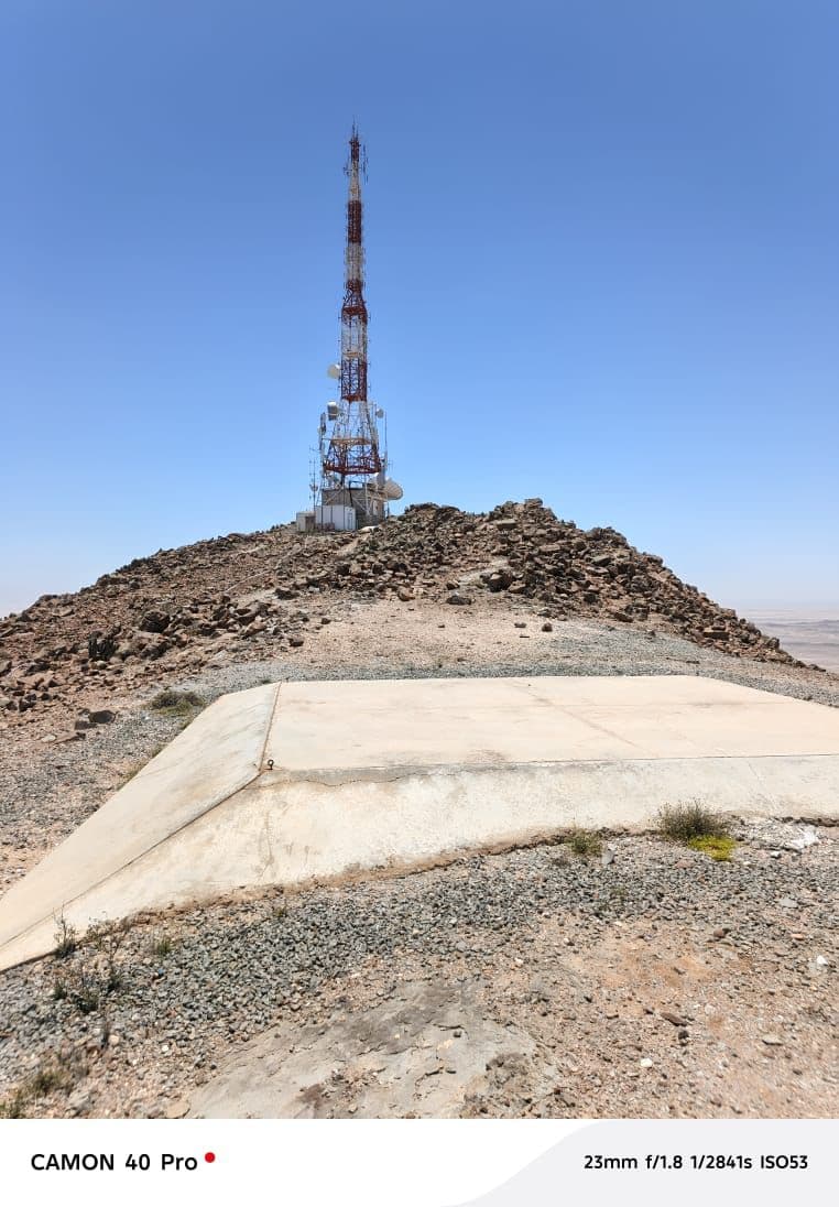 A communications tower above a prepared site